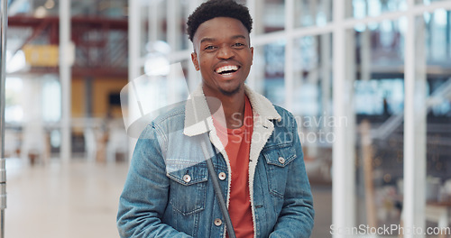 Image of Black man, face and smile portrait in building for designer success, positive mindset and employee standing in lobby. African man, portrait and happy for innovation vision or entrepreneur headshot