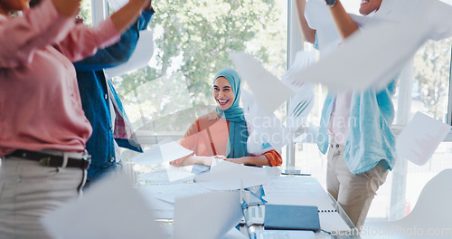 Image of Success, goals or team with documents in air to celebrate meeting office kpi sales target for business growth. Paperwork, Muslim woman or excited people in celebration of winning or group achievement