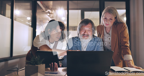 Image of Laptop, tablet and business people teamwork on night project, digital finance portfolio or feedback review of stock market research. Financial economy, investment collaboration and trader trading nft