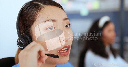 Image of Confused, frustrated and call center woman consulting customer with unhappy, moody and annoyed face zoom. Customer service consultation of asian corporate girl in conversation with difficult client