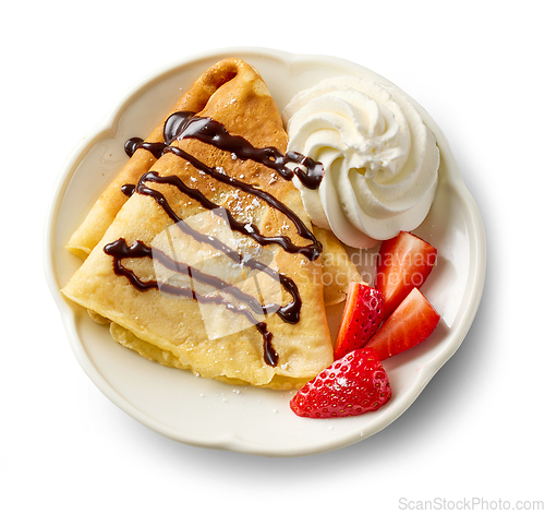 Image of freshly baked crepe with whipped cream