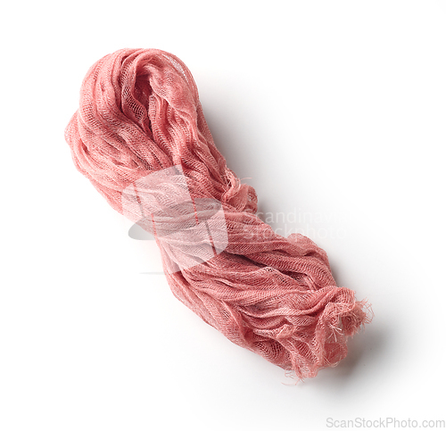 Image of crumpled pink cotton napkin