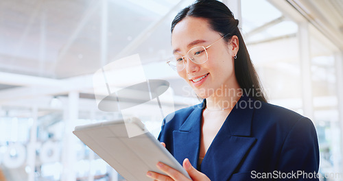 Image of Business woman, tablet and technology, typing email for company communication or digital report. Internet, wifi and ux, networking and Asian employee with smile and inspiration in Japan office