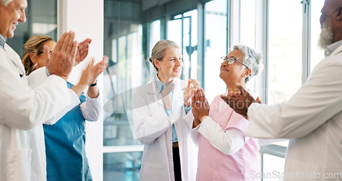 Image of Doctor, nurse and team applause in celebration for healthcare achievement, goal or promotion at hospital. Group of medical professional clapping and celebrating teamwork, unity or victory at clinic