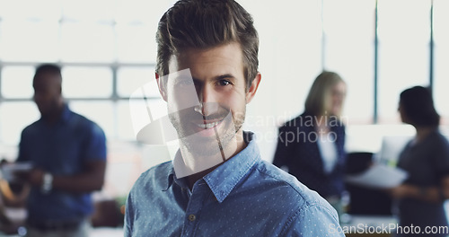 Image of Portrait, confident and business man in an office with a smile, happy and proud of startup growth. Young, worker and employee with a positive mindset at his workplace as an entrepreneur