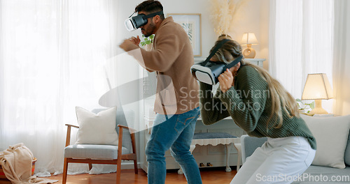 Image of Gaming, vr and metaverse with couple in living room for future, technology and 3d digital games. Innovation, virtual reality and internet with man and woman gamer at home for relax, happy and boxing