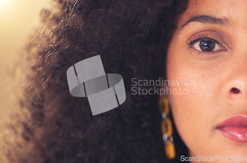 Image of Intense first responder and medical staff member looking concerned about trauma. Closeup face and portrait of worried black healthcare professional. Young woman thinking about serious sad memories