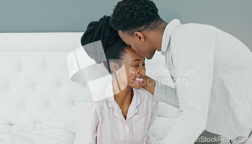 Image of Breakfast in bed, love and black couple being romantic on their honeymoon, birthday or anniversary in a hotel room. Happy man kissing woman on head to express love and care while bonding in bedroom