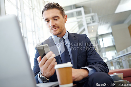 Image of Businessman, reading on smartphone with communication and technology, notification on social media or email. Executive male and business contact, networking and ceo in corporate lounge