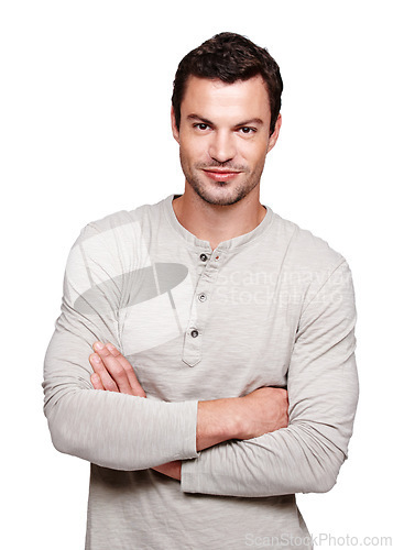 Image of Handsome man, smile and arms crossed in focus with vision for happy ambition, goal or profile against white background. Portrait of a isolated young male smiling with crossed arms on white background