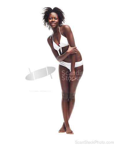 Image of Portrait, beauty and underwear with a model black woman in studio isolated on a white background. Bikini, skin and wellness with a sexy female posing to promote body positivity or natural care