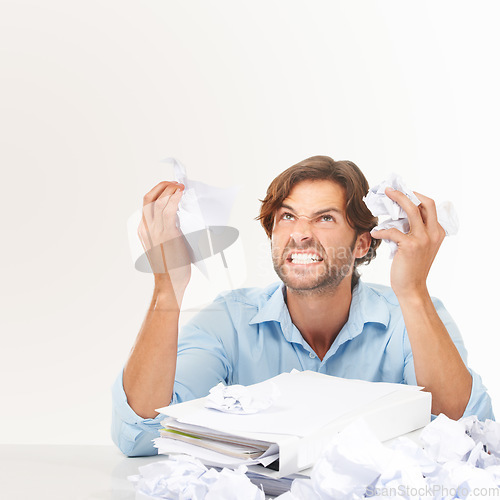 Image of Angry, stress and businessman with crumpled paper for brainstorming, thinking of bad ideas and strategy. Corporate work, burnout and frustrated employee with mess of documents, paperwork and notes