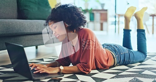 Image of Music, laptop and relax girl on floor carpet streaming radio rap, disco or rock song while singing trendy audio. Headphones, energy or student black woman listening to wellness sound and typing on pc