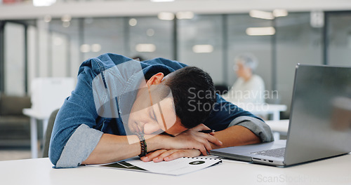 Image of Businessman, yawning or desk sleeping in modern office, digital marketing startup or advertising branding company. Tired, fatigue or exhausted creative designer and laptop technology or bored burnout