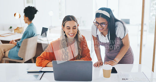 Image of Success, fist bump or happy employees with a handshake in celebration of digital marketing sales goals at office desk. Laptop, winner or excited women celebrate winning an online business deal at job