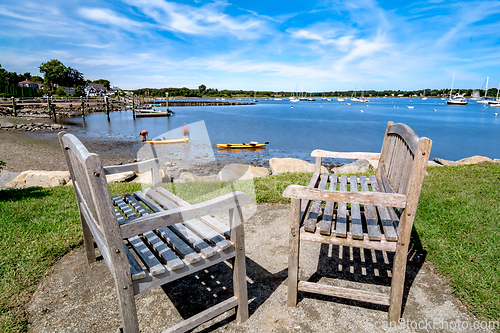 Image of Small boats lining waterfront in Wickford Cove