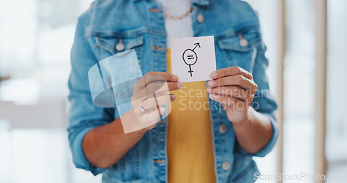 Image of Gender equality, pay gap and woman with a sign in the office with a female and male symbol. Business, equity and girl employee with a feminism card in protest for equal salary, opportunity and equity