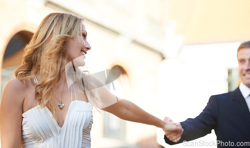 Image of Happiness, woman holding hands with man and celebration for wedding, achievement and outdoor. Romance, couple touch hand or happy with romantic gesture, elegant or ceremony with smile or quality time