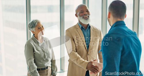 Image of Handshake, welcome and thank you with business people in office after interview with manager. Shaking hands, diversity and b2b partnership, collaboration or happy business deal, success and teamwork