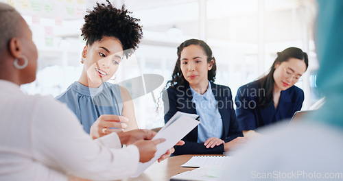 Image of Laptop, documents and teamwork of business people in meeting. Planning, collaboration and group of women with computer and paperwork discussing sales, advertising or marketing strategy in office.