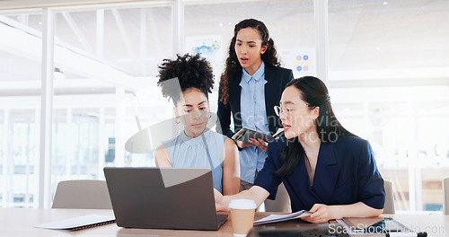 Image of Business women, laptop and collaboration in office for marketing management, leader innovation or strategy research. Team meeting, employee support and tech manager or leadership idea discussion