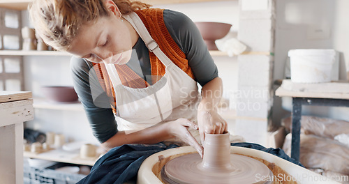 Image of Pottery wheel, woman and sculpture in artist studio, workshop and small business of creative product, craft and manufacturing. Ceramic designer, clay artisan and expert mold form for handmade process