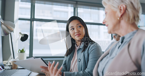 Image of Business, women and conversation in office, marketing planning and advertising campaign. Females, ceo and employees for sales growth, manager explain system and communication for process and speaking