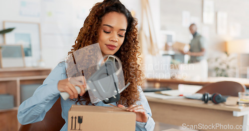 Image of Delivery boxes, black woman shipping package or ecommerce sale with supply chain, logistics or courier product in retail shop. Woman, retail sales worker or design store manager for commercial export