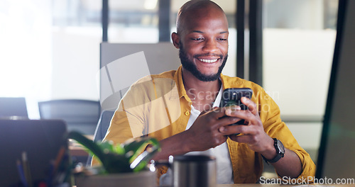 Image of Black man, phone and office chat while online for communication, social media or reading email, news or content creator post. Smile on face of employee at desk for project research on website