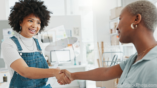 Image of Business deal, agreement and shaking hands with a client or customer. Businesswoman making a deal for a purchase or meeting a new buyer in startup company in ecommerce, online and delivery business