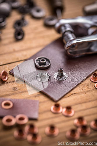 Image of Leather and rivets