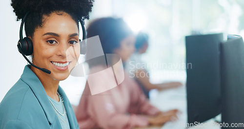 Image of Black woman, call center and contact us with CRM and portrait in office with smile and professional in customer service or telemarketing. Customer support, work at desk and headphone with microphone.