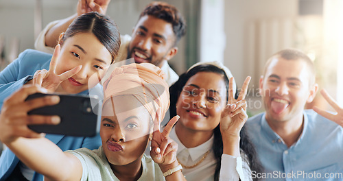 Image of Phone selfie, peace sign and business team in startup office of creative marketing agency. Teamwork, diversity and happy men and women smile for crazy photo on smartphone in modern office.