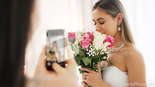 Image of Phone photography of bride, bouquet and wedding celebration happy, love and smile in luxury designer dress at hotel. Rich girl, smartphone and flowers photo in bridal gown to celebrate marriage event