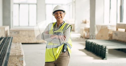 Image of Architect, arms crossed or engineering designer in architecture motivation, real estate vision or office building ideas. Portrait, happy smile or property construction worker woman on site innovation