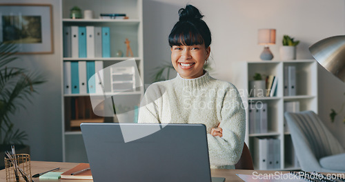 Image of Happy, business woman and smile on laptop in success for company startup at work with crossed arms. Confident female employee worker smiling in happiness for job or career on computer at the office