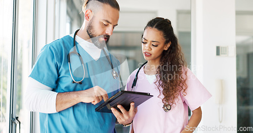 Image of Healthcare team, tablet and medical nurse and surgeon talking, discussion and communication about results. Man and woman hospital staff meeting using technology for planning, innovation and medicine