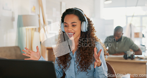 Image of Video call, customer service woman in a courier office for product consulting, sales negotiation or ecommerce. Logistics, customer support or business consultant laptop, headphones and shipping boxes