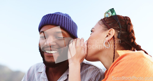 Image of Whisper, communication and friends in a gossip conversation about secret, rumor or interesting couple news. Rooftop discussion, talking in ear and gen z woman share information to listening black man