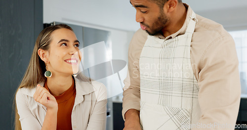 Image of Young couple in kitchen, people cooking in Mexico apartment and comic Indian man joke with girlfriends smile. Face of happy latino woman talking, bonding on home date and love funny time together