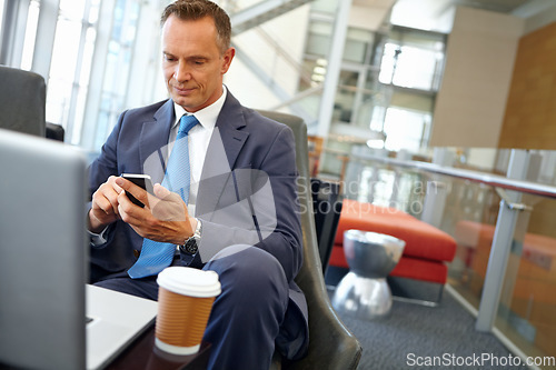 Image of Businessman, laptop and smartphone with senior and ceo company communication or social media with coffee. Contact, online and email with networking, b2b and worker in professional corporate lounge