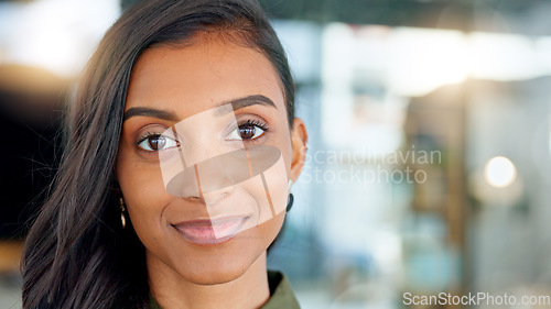 Image of closeup portrait of happy, beautiful young woman smiling and laughing while looking into camera. Fun, charming attractive female faces with a smile of joy. Expressive lady standing with lovely grin