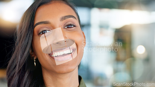 Image of closeup portrait of happy, beautiful young woman smiling and laughing while looking into camera. Fun, charming attractive female faces with a smile of joy. Expressive lady standing with lovely grin