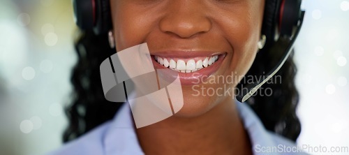 Image of Call center, smile and black woman for customer service, support and telemarketing in CRM office. Face of receptionist person with white teeth for communication, consulting and contact us help desk