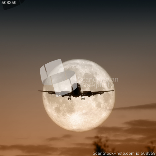 Image of air plane full moon