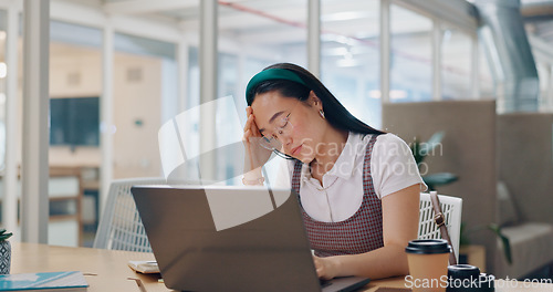 Image of Laptop, burnout or woman with headache, stress or fatigue at office desk working on a digital marketing SEO project. Tired, overworked or upset Japanese employee frustrated with migraine pain problem