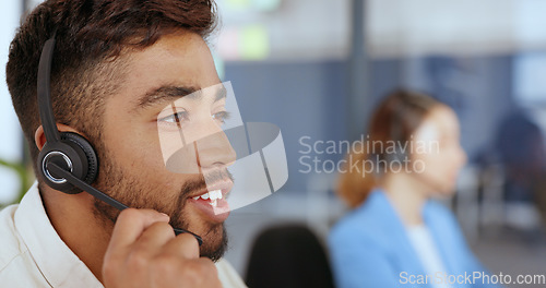 Image of Call center, telemarketing and face of a man giving advice, technical support and help online on a computer. Contact us, customer service and consultant consulting for sales, crm and service job