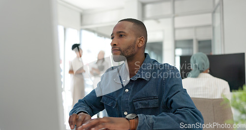 Image of Office computer, thinking and black man reading feedback review of social network, customer experience or ecommerce. Website analytics, research report and media employee doing online survey analysis