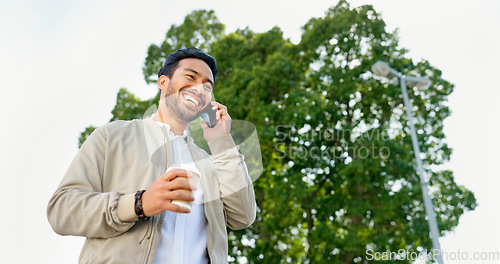 Image of Young businessman, outdoor phone call and celebration for good news, promotion or success on walk to work. Man, walking and using phone for conversation, networking and winning with goals in morning