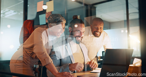 Image of Collaboration, success and a business team cheering together in their office while working on a laptop. Computer, teamwork and celebration with a man and woman employee group saying yes or wow